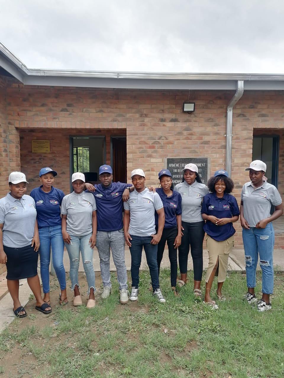 Young students learning at the Mawewe Community Multimedia Centre